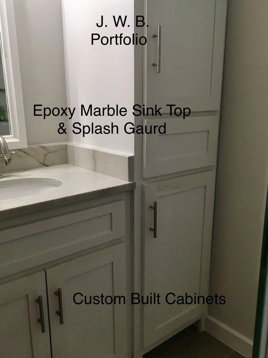 Custom bathroom cabinetry with a marble-style epoxy countertop
